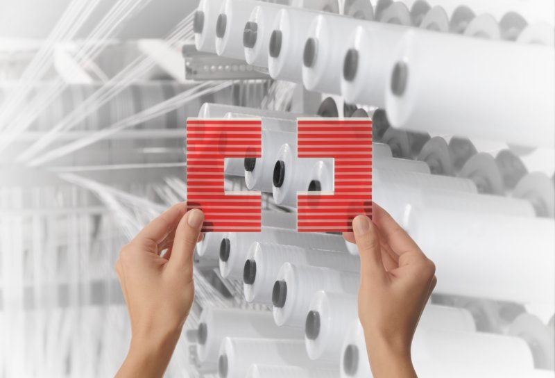 Fadenspulen mit SERV-Klammer Bild von Fadenspulen mit SERV-Klammer